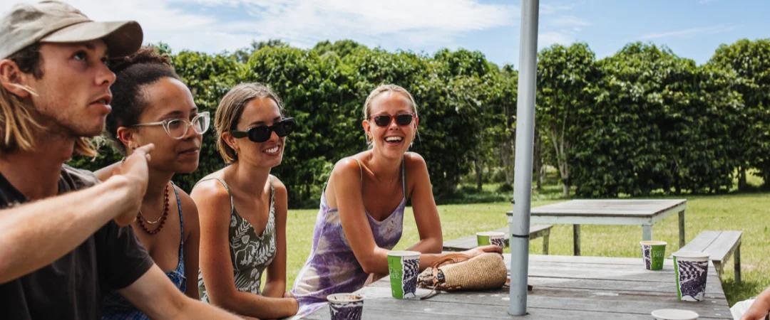 visitors enjoying their visit to a coffee farm